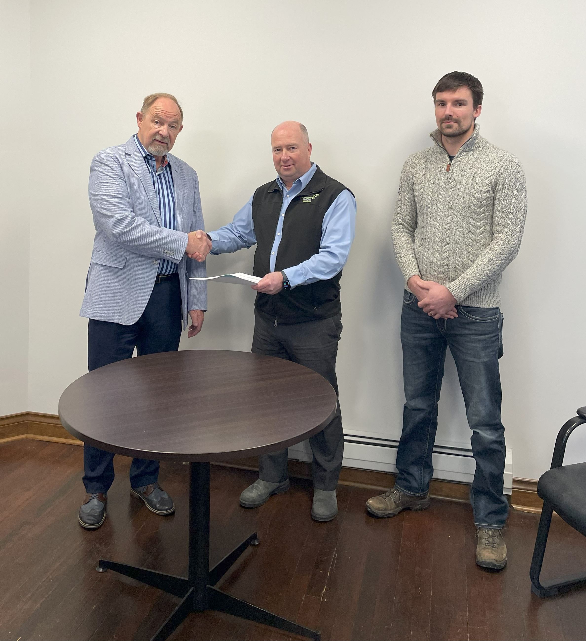 Council Members Shaking Hands at Signing of Memorandum of Understanding